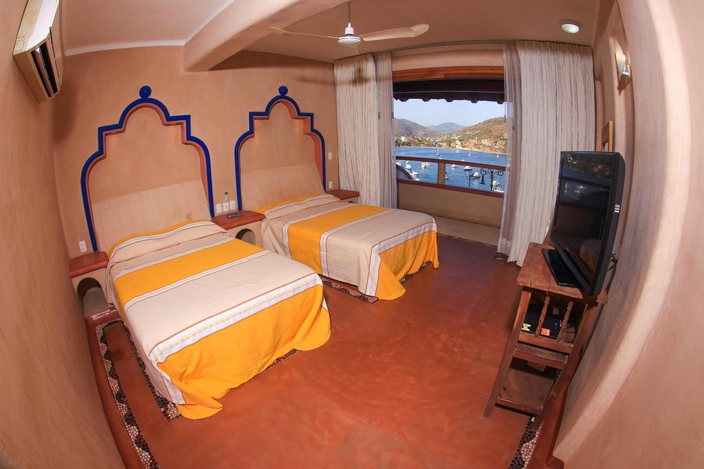 Villa Del Pescador Zihuatanejo Zimmer foto